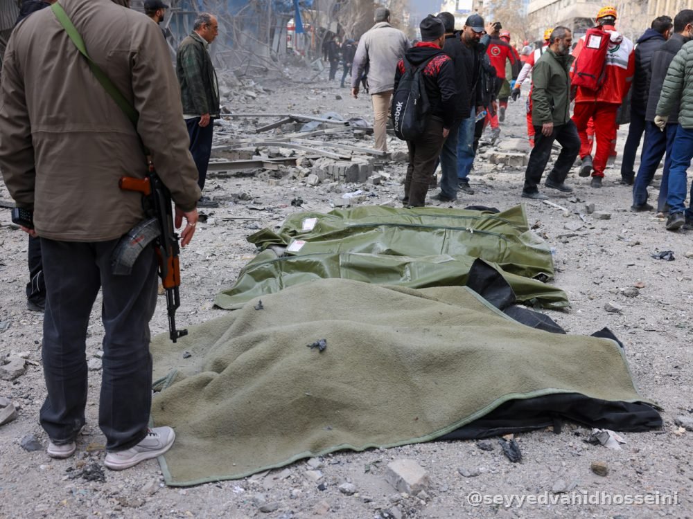 Rescue Workers Among the Rubble